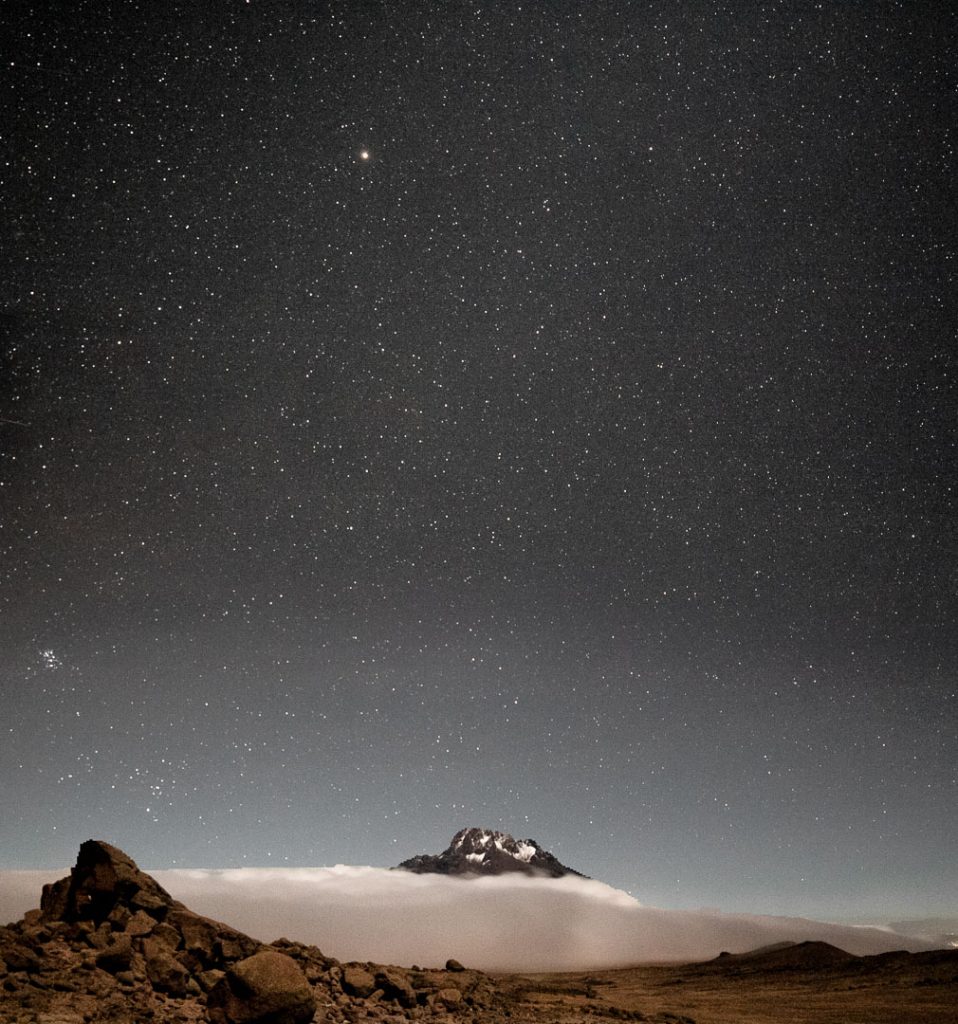 astrophotography on mountain cloud inversion